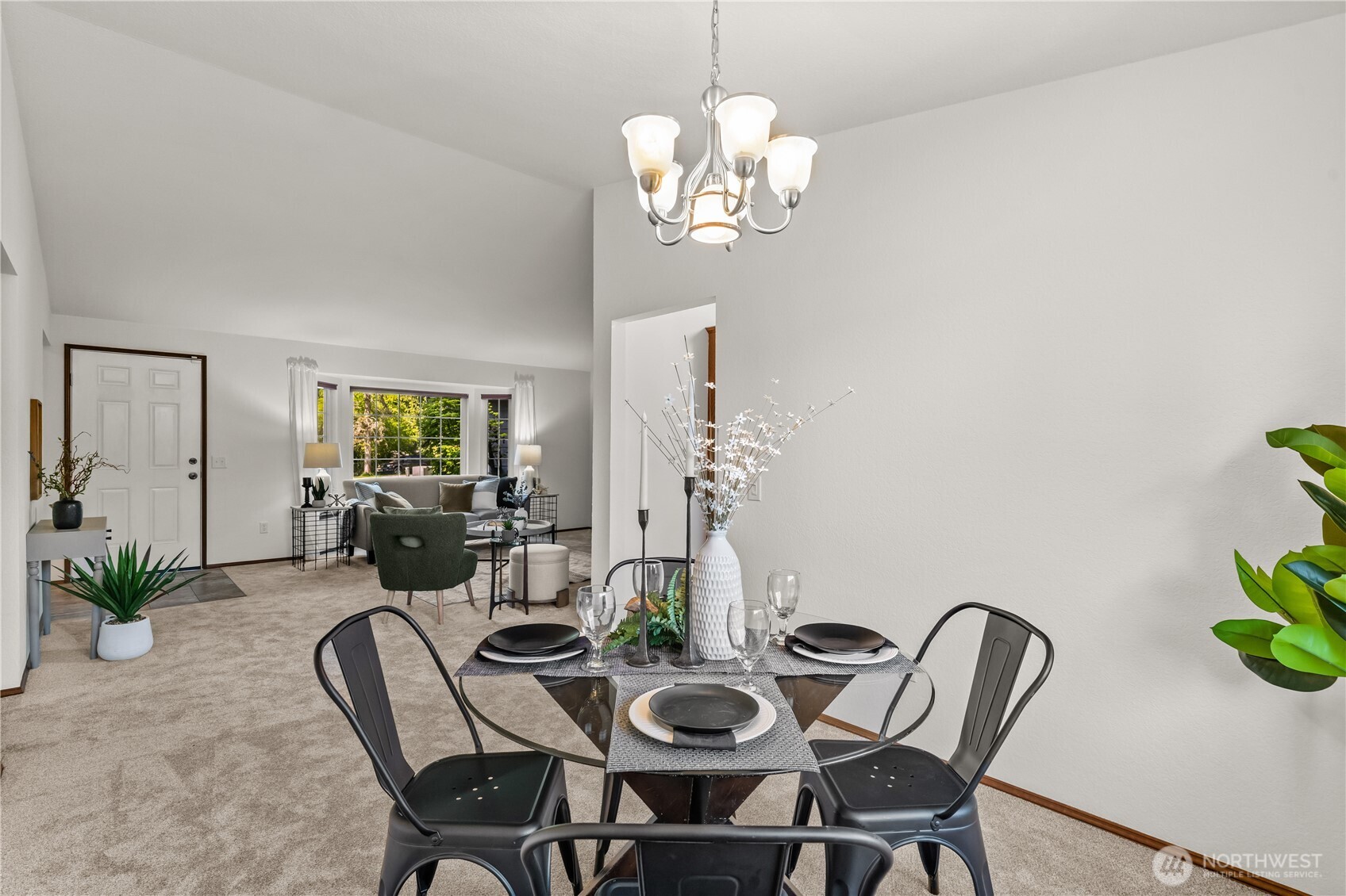 518 Hubbard Road Lynnwood, WA 98036 - Photo 7 of 39 a view of a dining room with furniture and chandelier