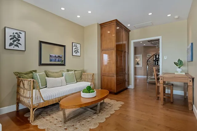 a living room with furniture and a table