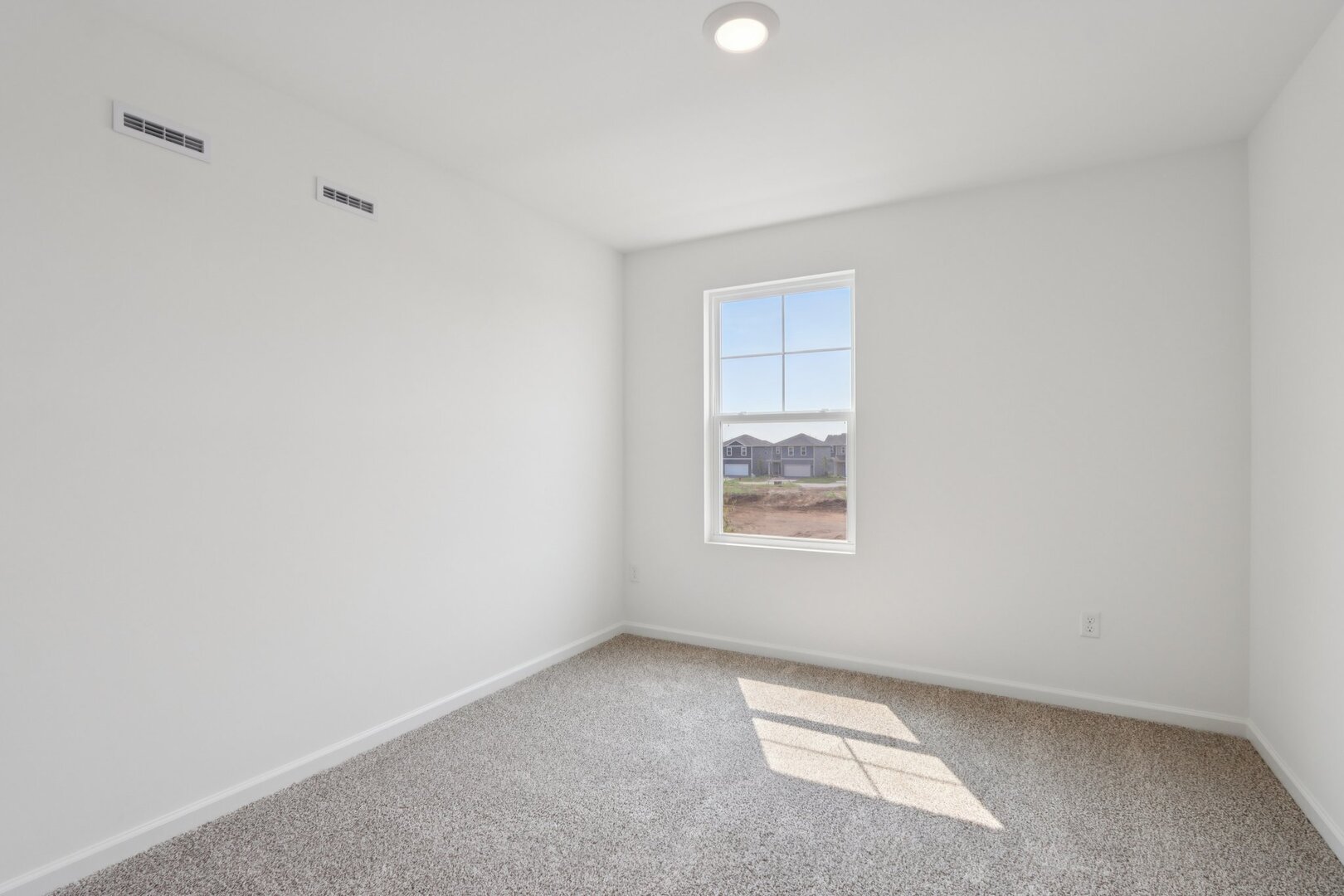 1811 Overland Drive Plainfield, IL 60586 - Photo 17 of 39 an empty room with a window