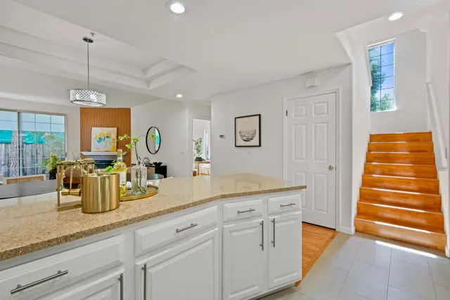 a kitchen with sink and window