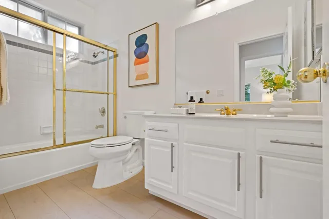 a view of a house with a tree