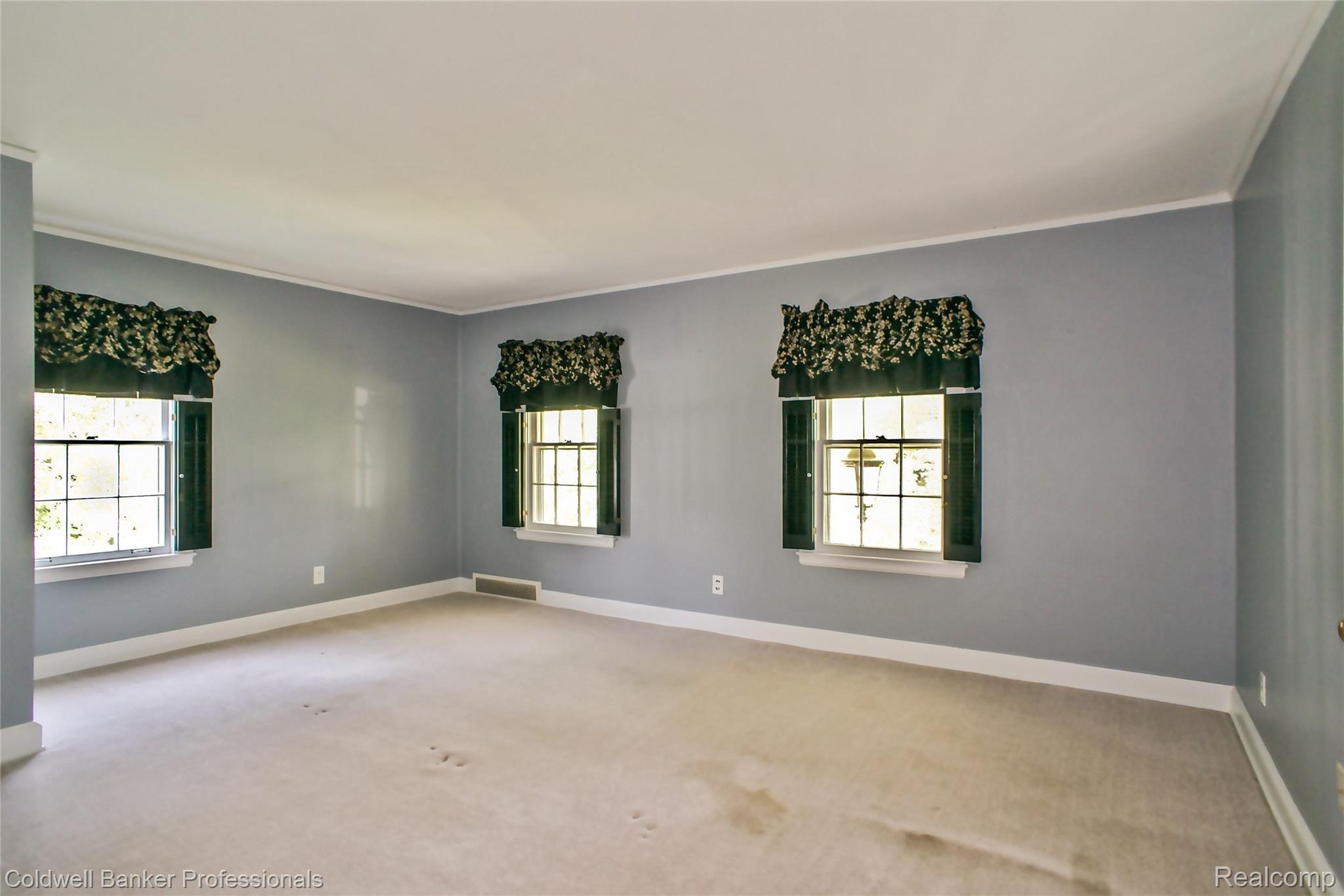 7755 Holcomb Road Clarkston, MI 48348 - Photo 33 of 51 All the bedrooms are oversized with built in closets and oak floors under the carpet