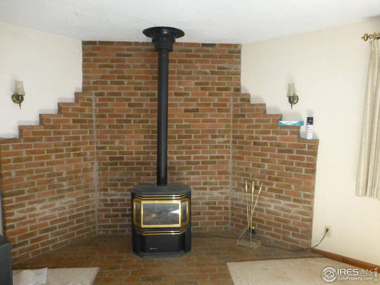9175 Valmont Road Boulder, CO 80301 - Photo 6 of 15 Gas burning fireplace in living room