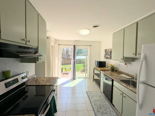 a view of entryway and workspace