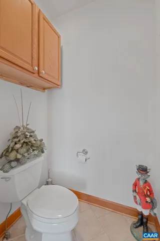 a bathroom with a sink vanity tub and a mirror