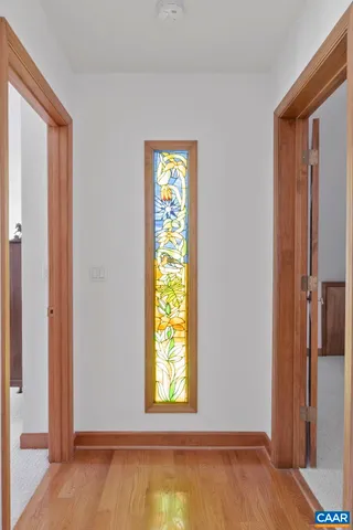 a view of a road with a building in the background