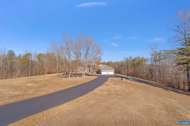 a view of a yard with trees