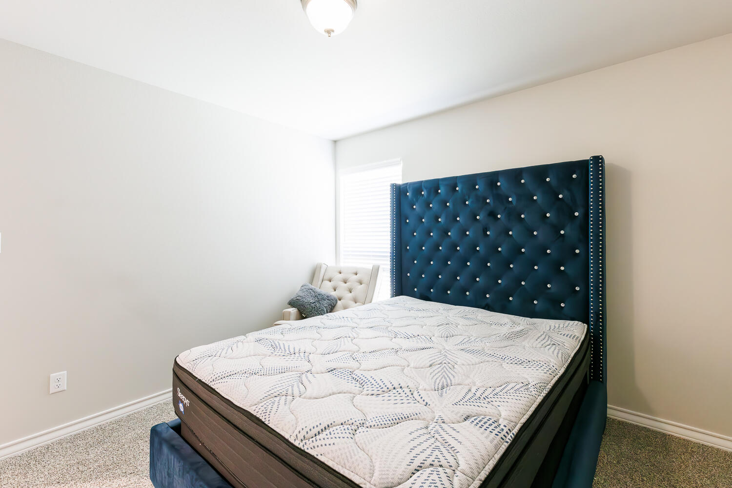 7205 25th Street Lubbock, TX 79407 - Photo 41 of 50 a close up of a bed in a room