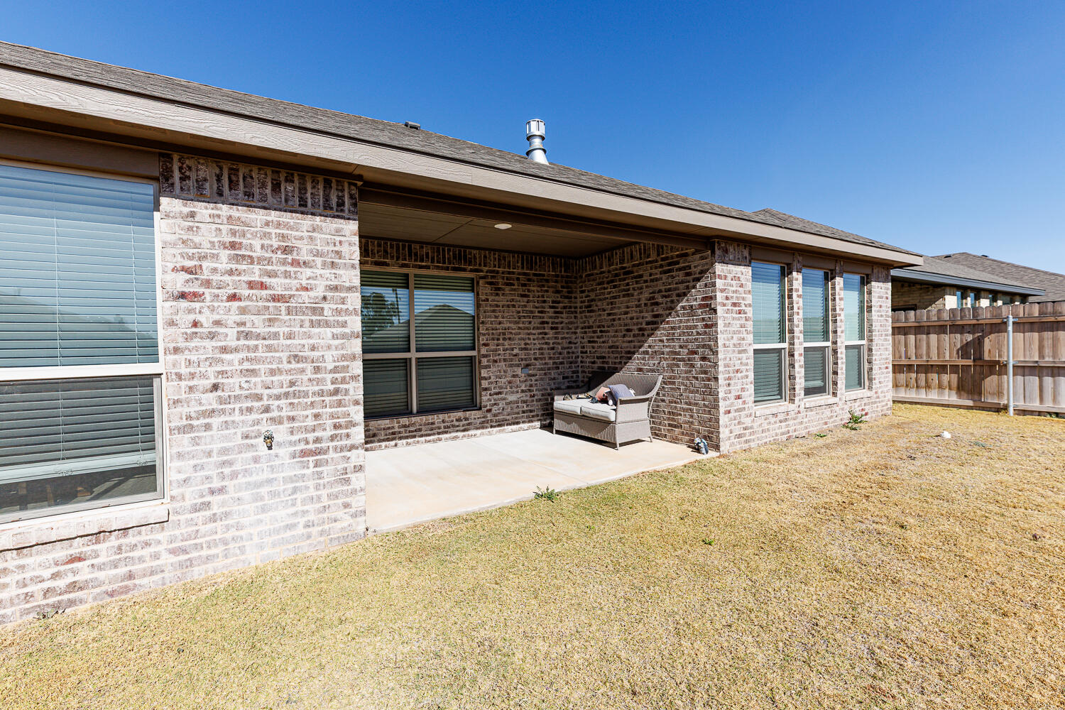 7205 25th Street Lubbock, TX 79407 - Photo 47 of 50 a front view of a house with a garage