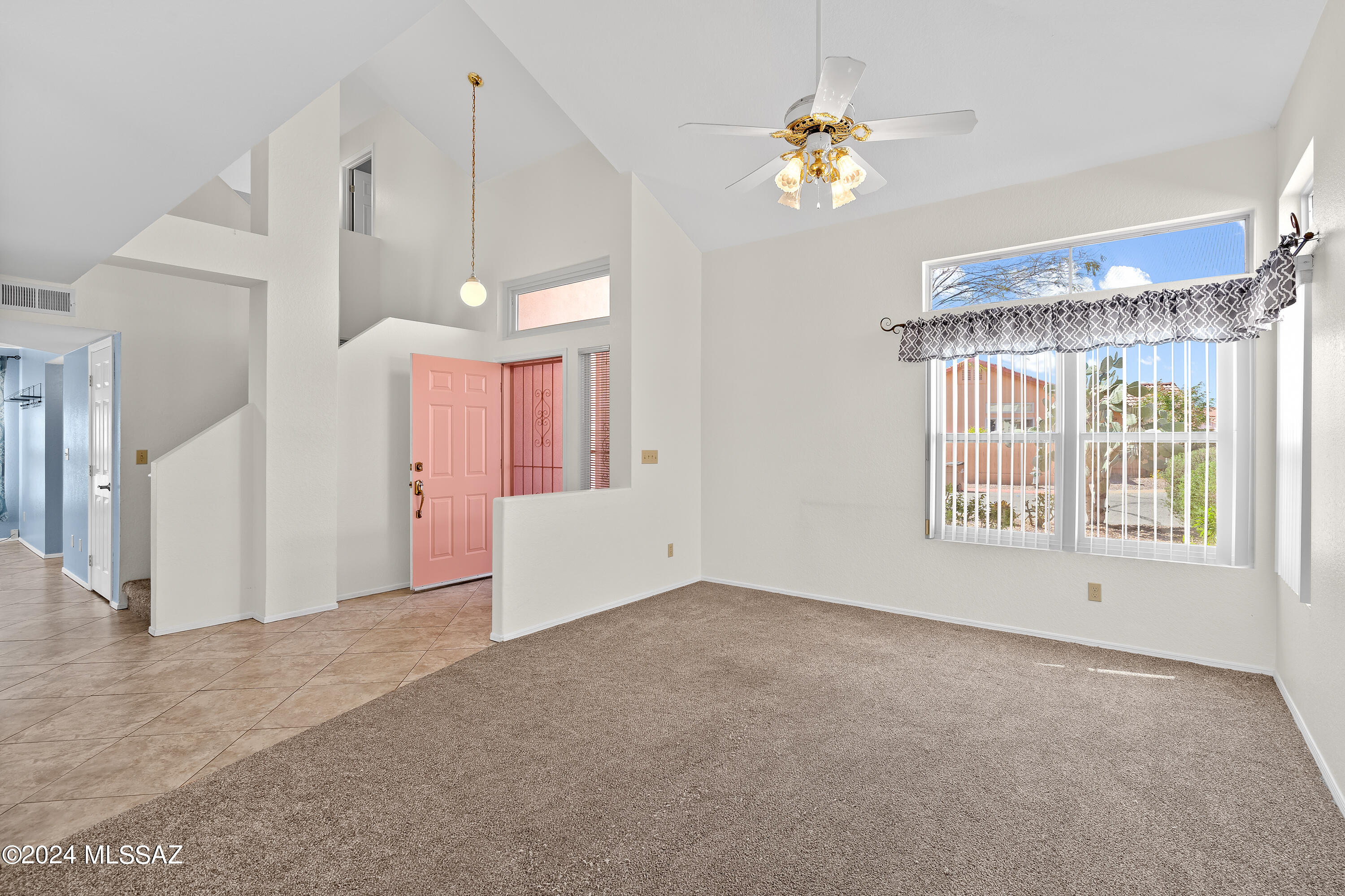 3476 West Sky Ridge Loop Tucson, AZ 85742 - Photo 5 of 31 a view of an empty room with a window