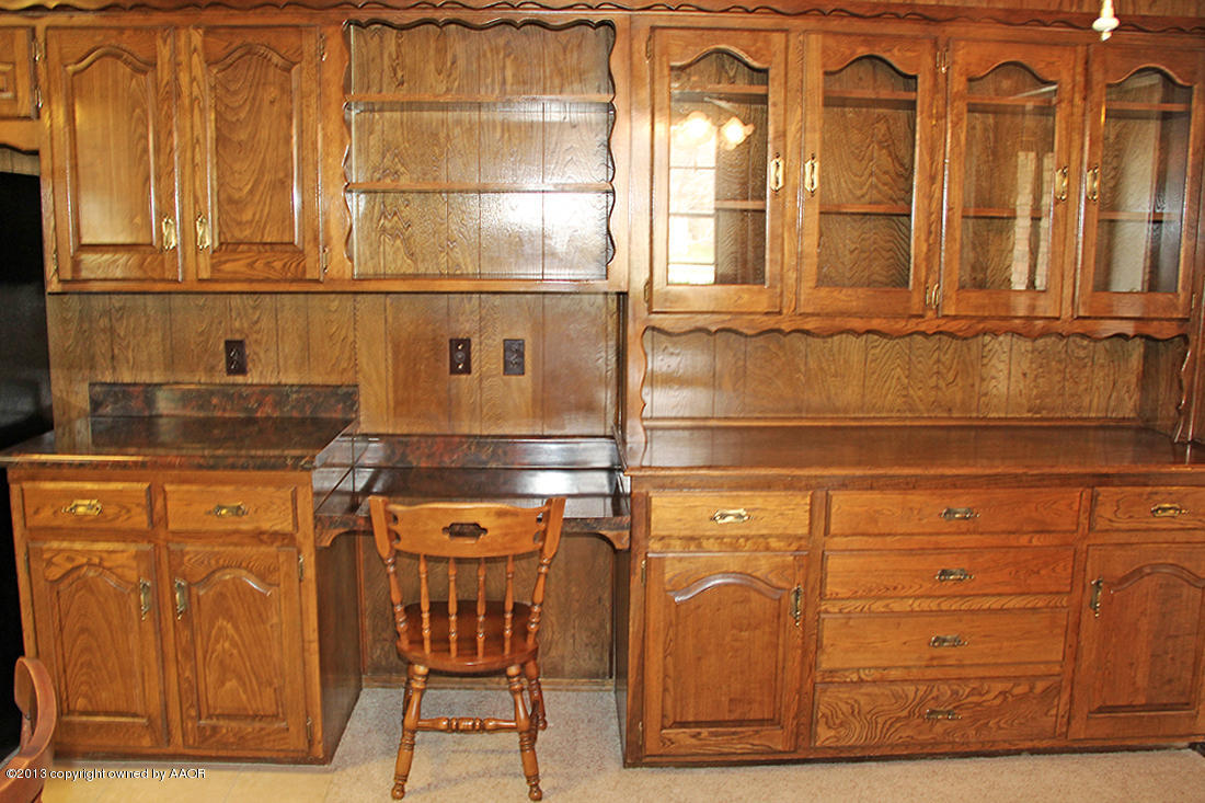 7103 Hatton Road Amarillo, TX 79110 - Photo 9 of 28 a close view of a sink and a refrigerator