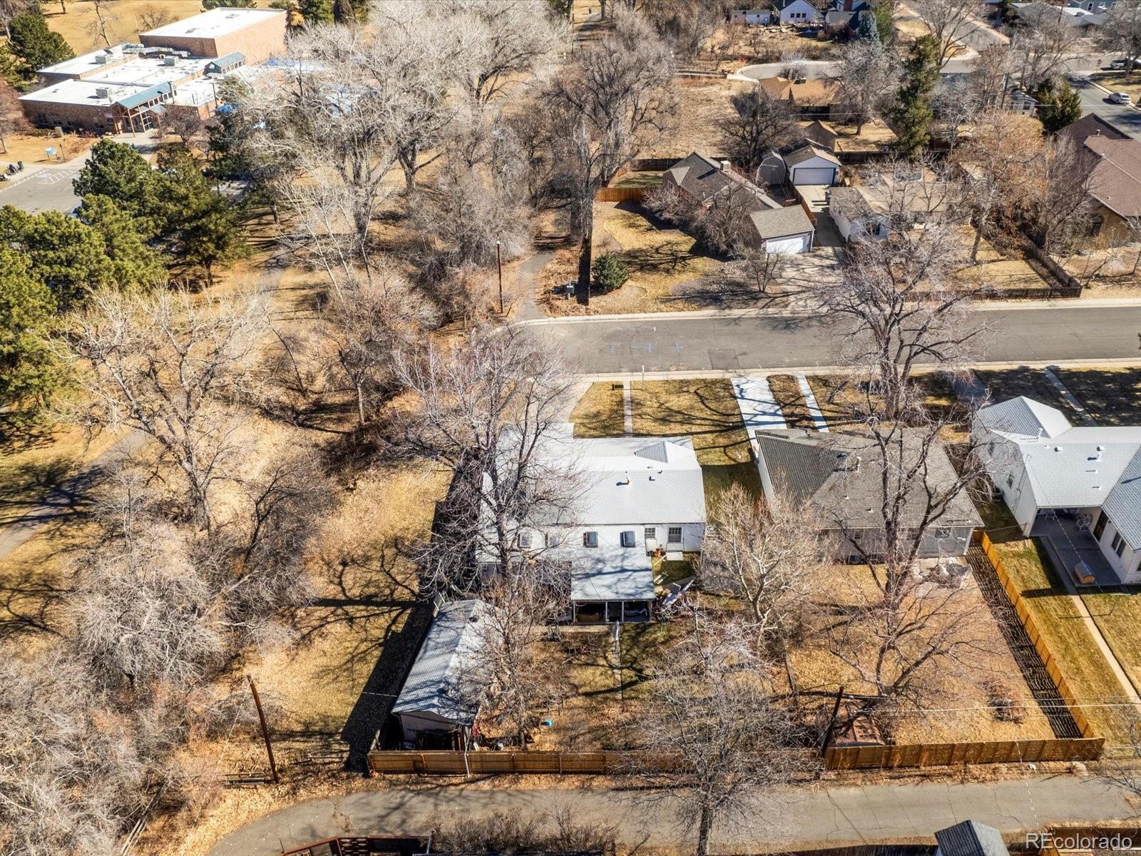 3145 South Ash Street Denver, CO 80222 - Photo 15 of 24 an aerial view of residential houses with outdoor space