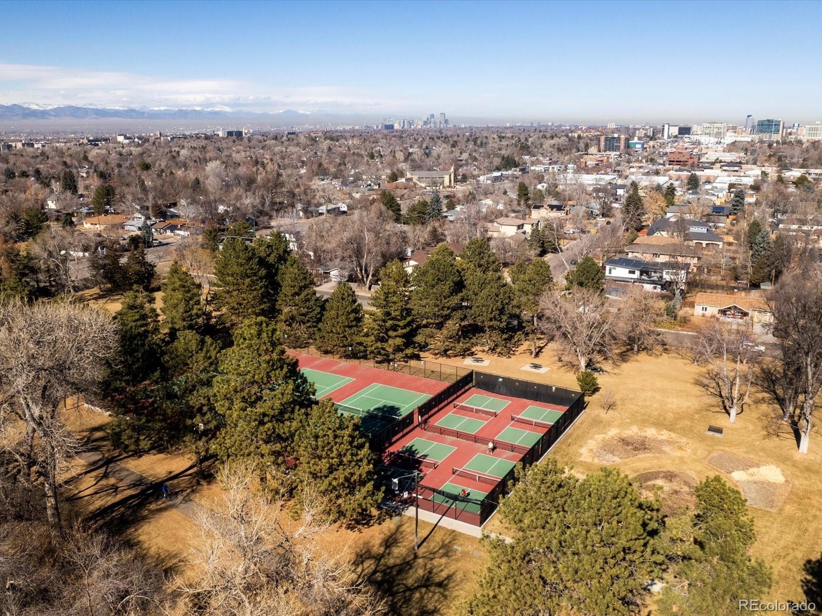 3145 South Ash Street Denver, CO 80222 - Photo 7 of 24 an aerial view of a houses with a swimming pool