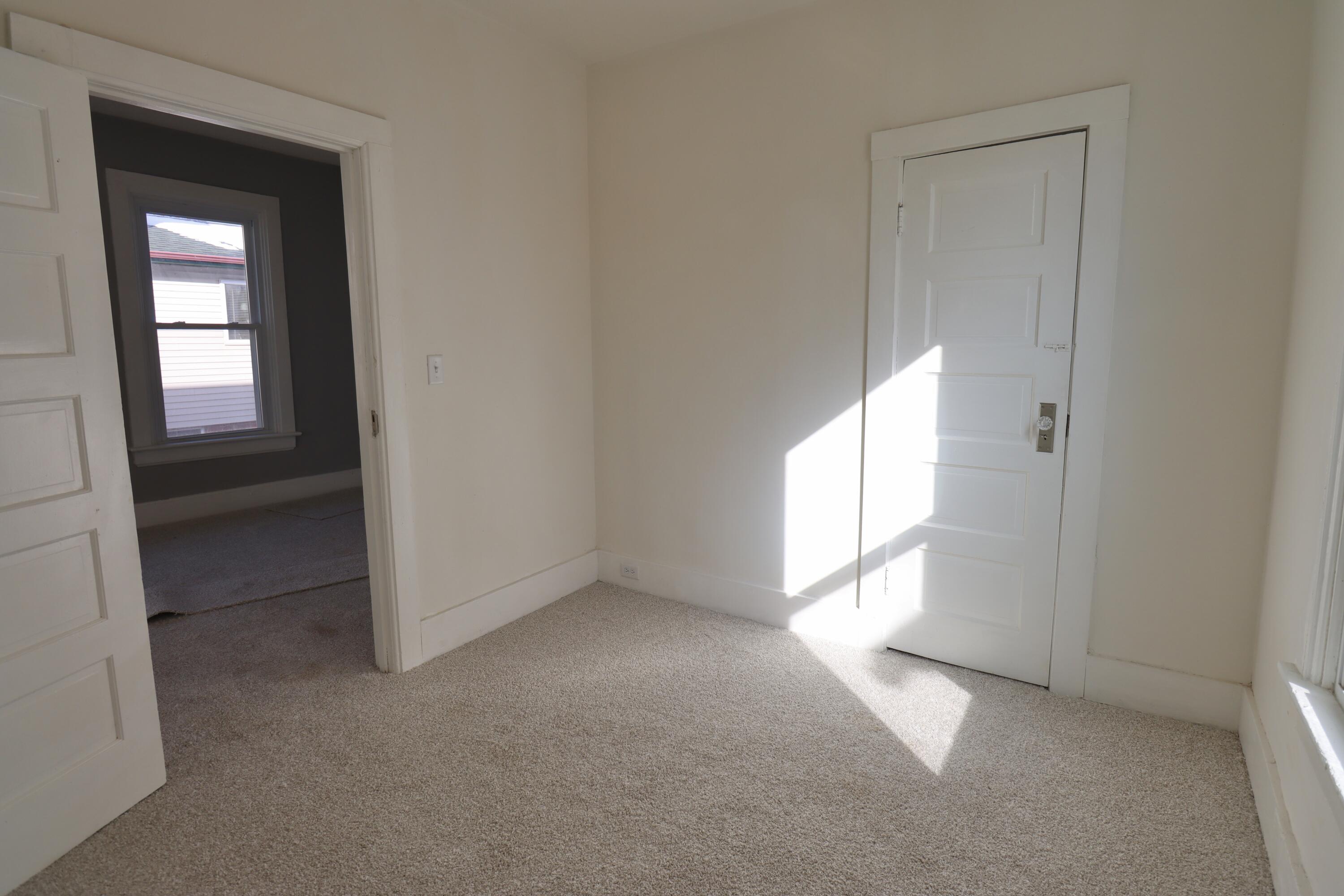 117 Patton Street La Porte, IN 46350 - Photo 20 of 45 an empty room with windows and closet