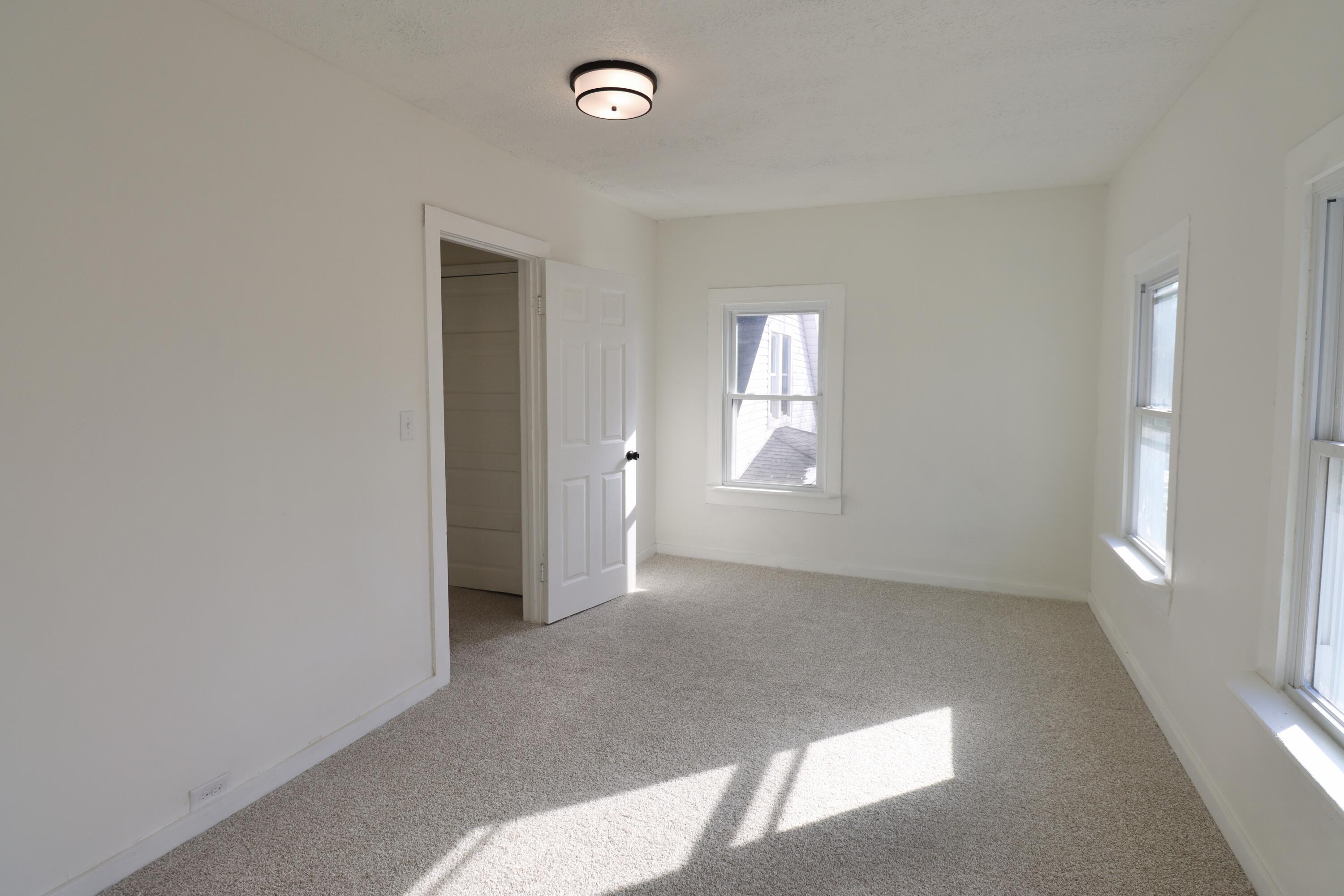 117 Patton Street La Porte, IN 46350 - Photo 24 of 45 an empty room with windows