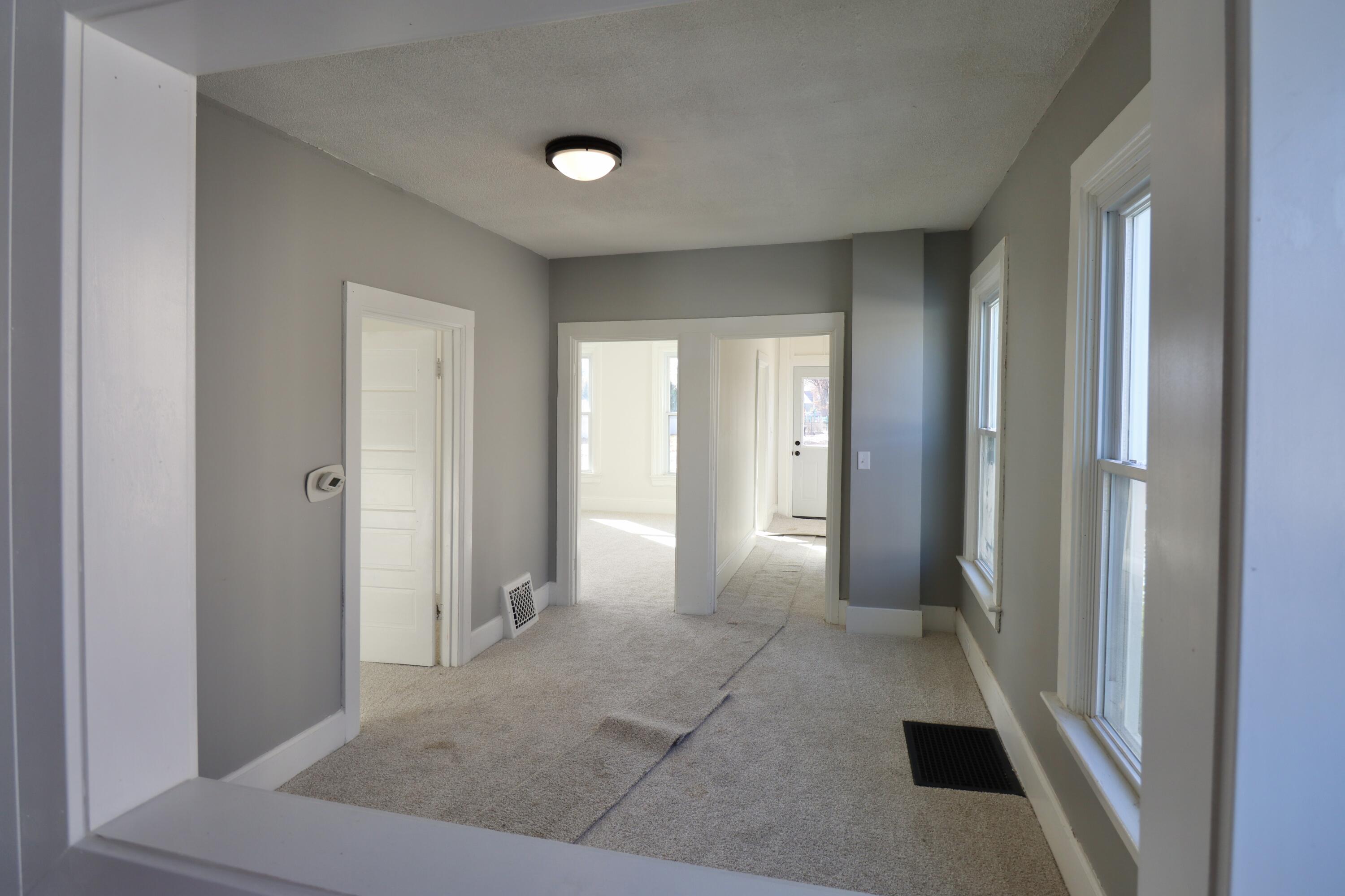 117 Patton Street La Porte, IN 46350 - Photo 10 of 45 a view of a bathroom with a sink and a mirror