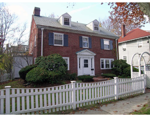 88 Williston Road Brookline, MA 02445 - Photo 1 of 22 a front view of a house with a garden