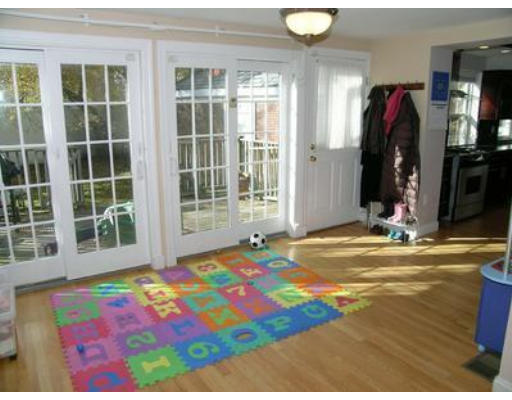 88 Williston Road Brookline, MA 02445 - Photo 11 of 22 a view of a bedroom with gym equipment