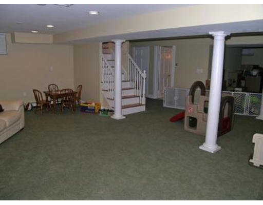 88 Williston Road Brookline, MA 02445 - Photo 13 of 22 a view of a livingroom with furniture and staircase