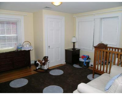 88 Williston Road Brookline, MA 02445 - Photo 17 of 22 a room with furniture flowerpot and window