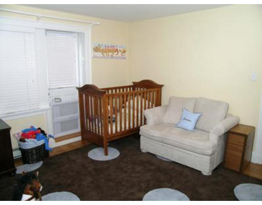 88 Williston Road Brookline, MA 02445 - Photo 18 of 22 a living room with furniture and a rug