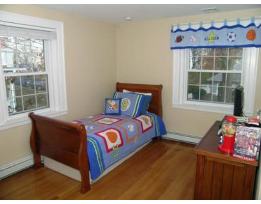 88 Williston Road Brookline, MA 02445 - Photo 19 of 22 a bedroom with a bed and a window