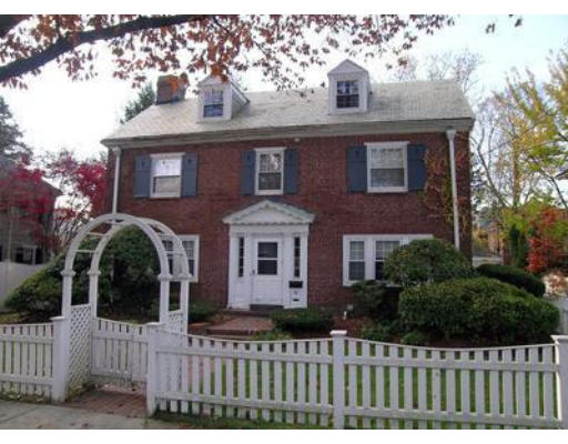 88 Williston Road Brookline, MA 02445 - Photo 2 of 22 a view of a house with a small yard and plants