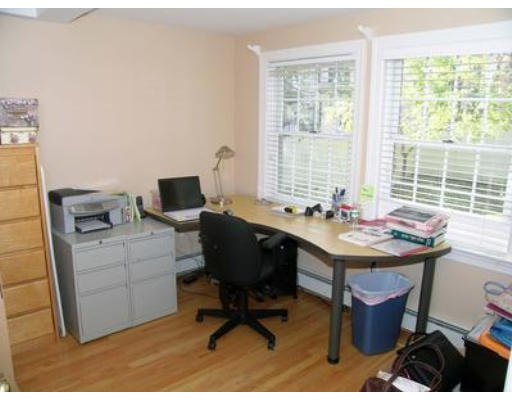 88 Williston Road Brookline, MA 02445 - Photo 6 of 22 a view of a workspace with furniture and a window
