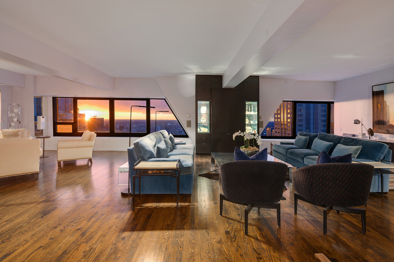 175 East Delaware Place, Unit 46254601 Chicago, IL 60611 - Photo 19 of 33 a living room with furniture and a wooden floor