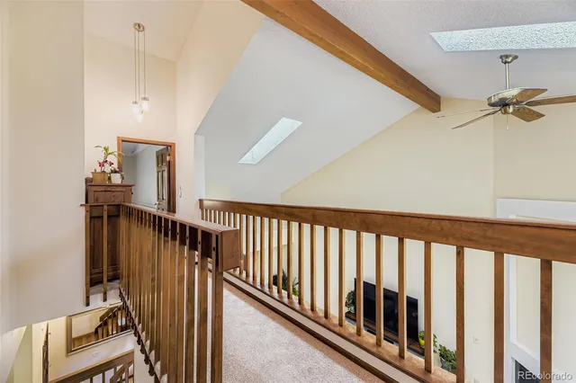 a view of a hallway with staircase