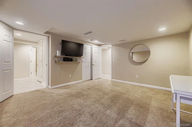 a view of a livingroom with a flat screen tv