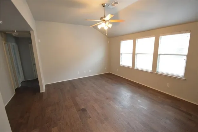 a kitchen with granite countertop cabinets and steel stainless steel appliances