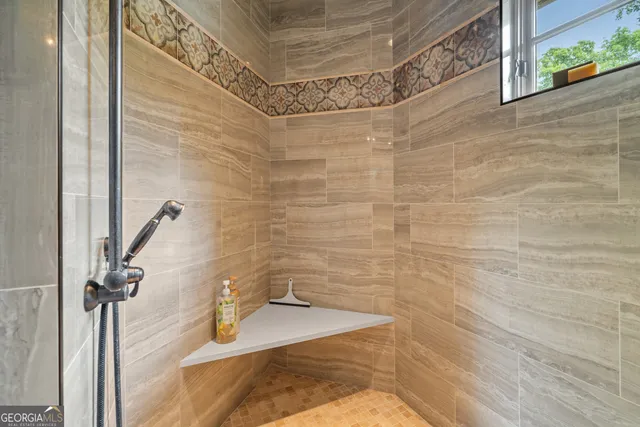 a bedroom with a bed and a gym equipment