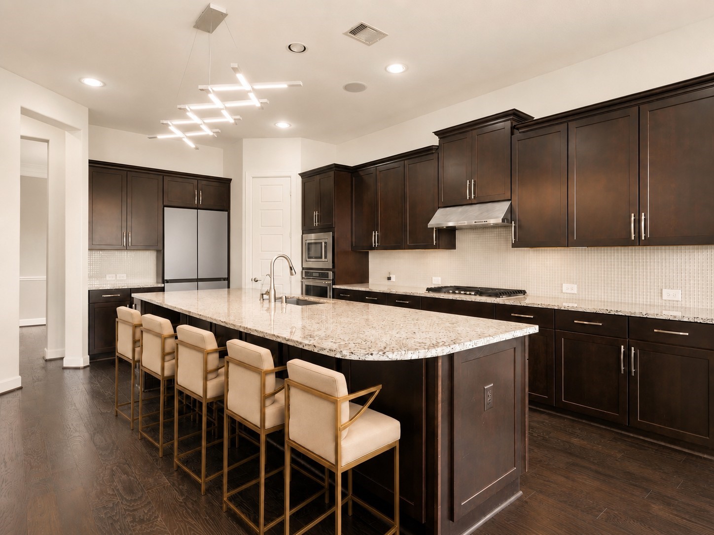 3622 Sage Hollow Drive Spring, TX 77386 - Photo 13 of 46 Designed with a premium minimalist feel, this gourmet workspace showcases sleek, full-height Lucente gloss glass tile backsplashes, built-in KitchenAid stainless steel appliances, and premium dark Java cabinetry. Virtually staged.