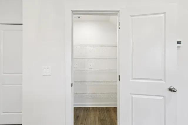 a room with storage and utility