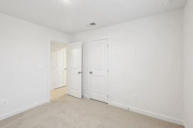 a bathroom with a double vanity sink mirror and double