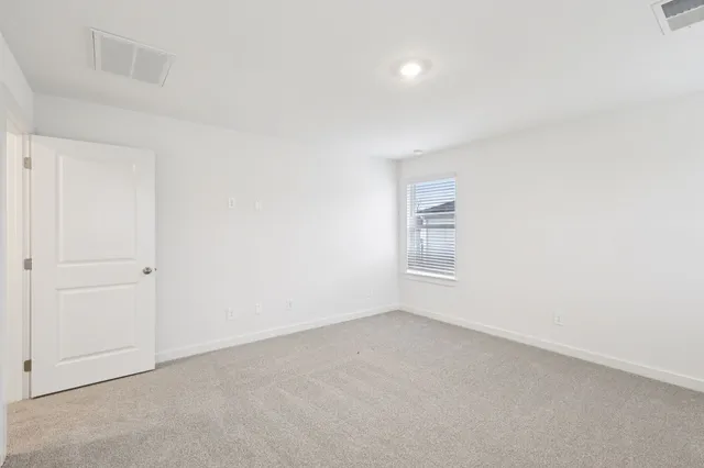a bathroom with a granite countertop sink and mountain view