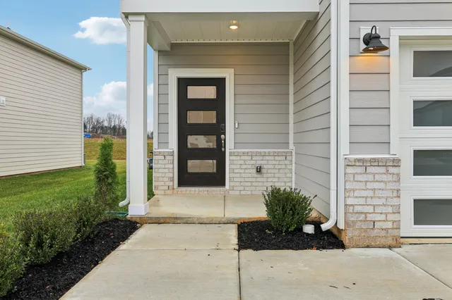 a view of a entryway door front of house