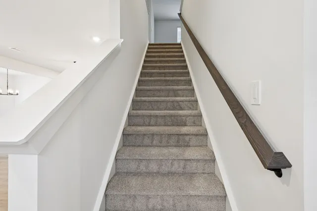 an empty room with wooden floor
