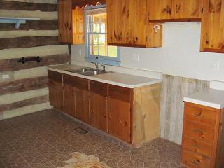 2084 Morgans Fork Road Penhook, VA 24137 - Photo 4 of 4 a kitchen with a sink and a window