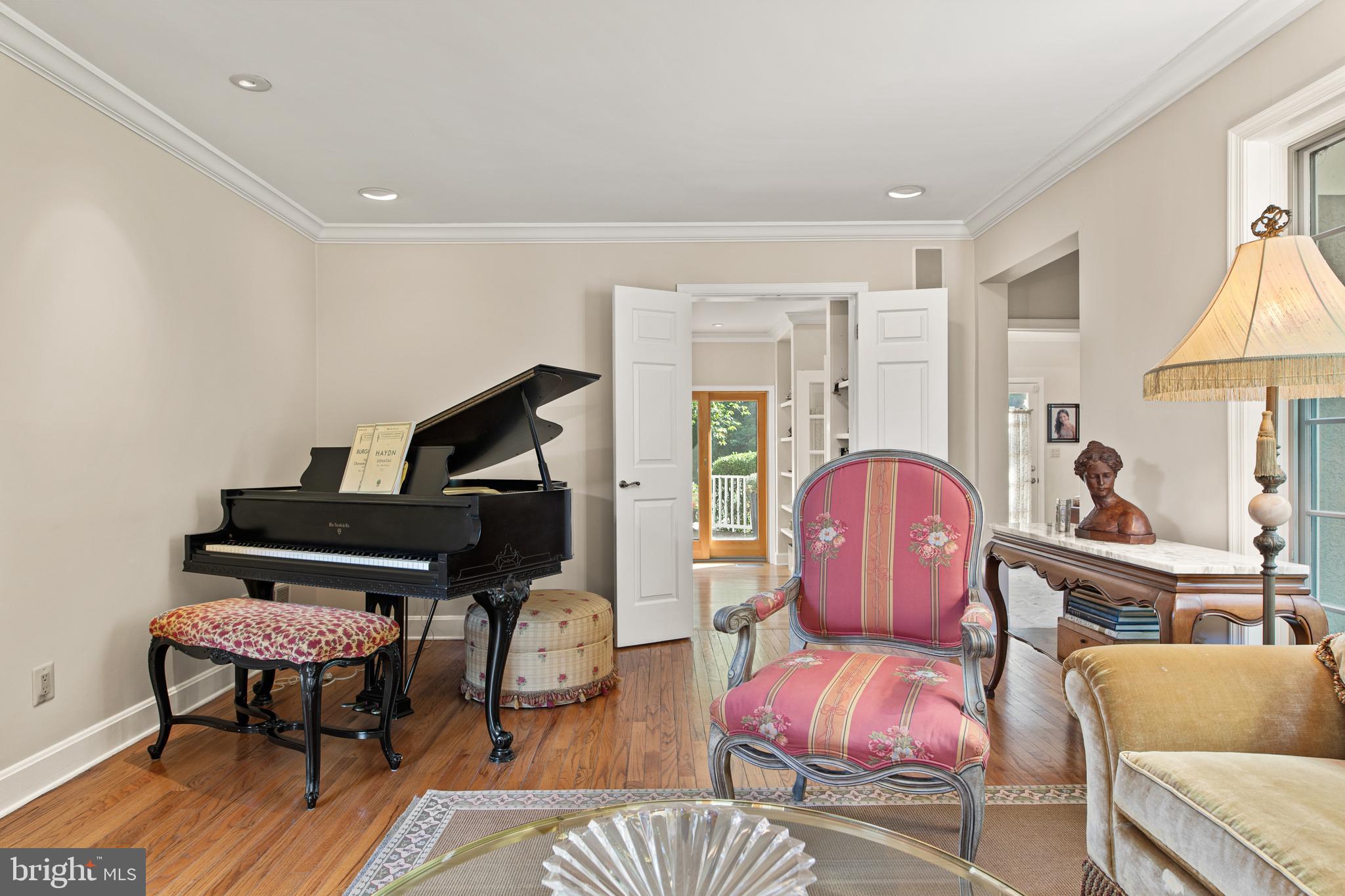 1429 Flat Rock Road Penn Valley, PA 19072 - Photo 11 of 58 a living room with furniture a rug and a window