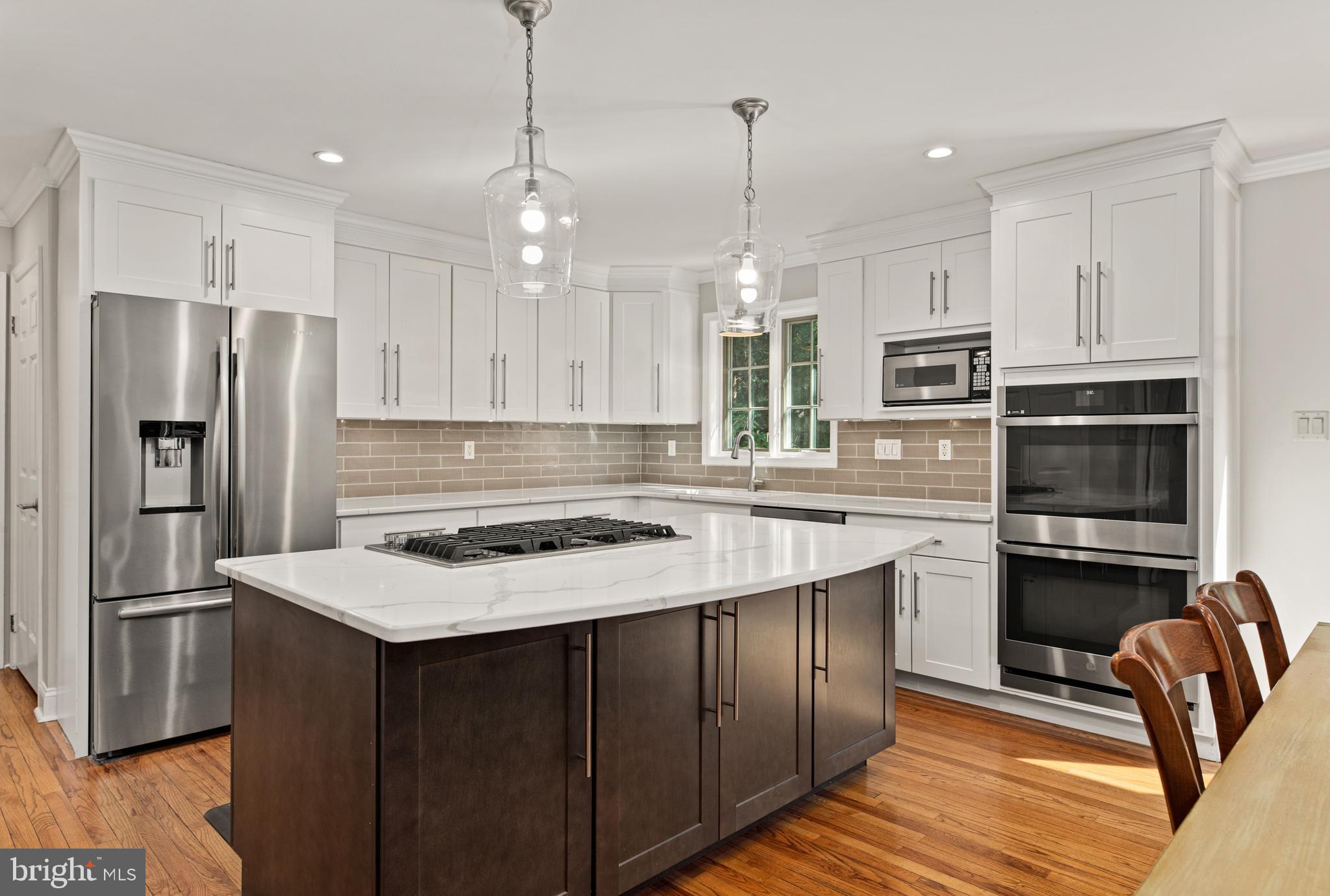 1429 Flat Rock Road Penn Valley, PA 19072 - Photo 19 of 58 a kitchen with a refrigerator sink and stove