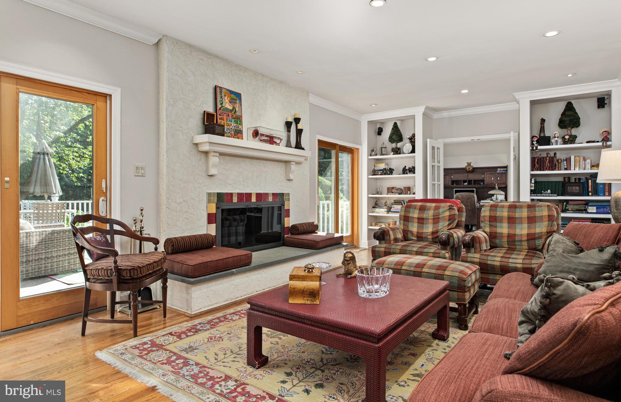 1429 Flat Rock Road Penn Valley, PA 19072 - Photo 22 of 58 a living room with furniture and a fireplace