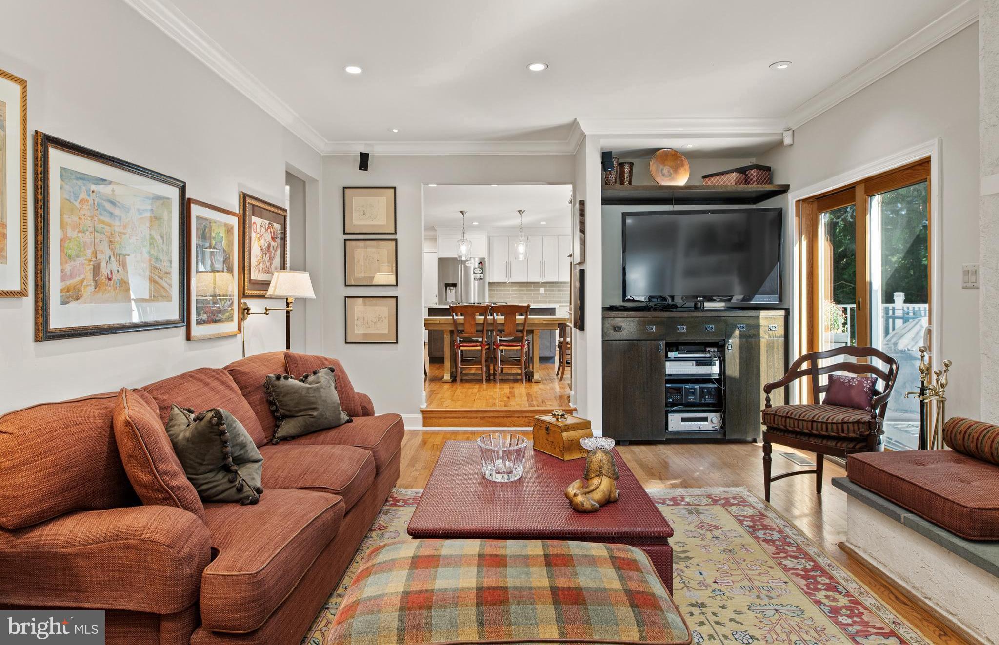 1429 Flat Rock Road Penn Valley, PA 19072 - Photo 24 of 58 a living room with furniture and a flat screen tv