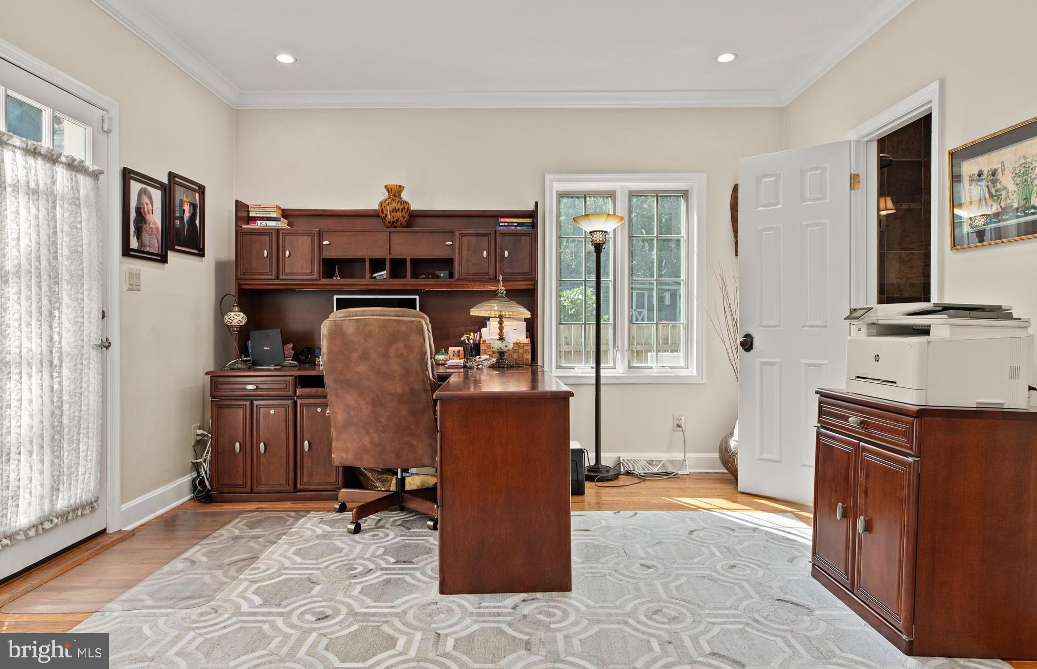 1429 Flat Rock Road Penn Valley, PA 19072 - Photo 25 of 58 a living room with furniture and a flat screen tv
