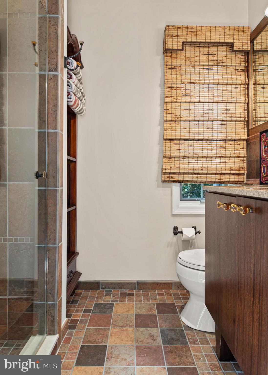 1429 Flat Rock Road Penn Valley, PA 19072 - Photo 26 of 58 a bathroom with a toilet a sink and a shower