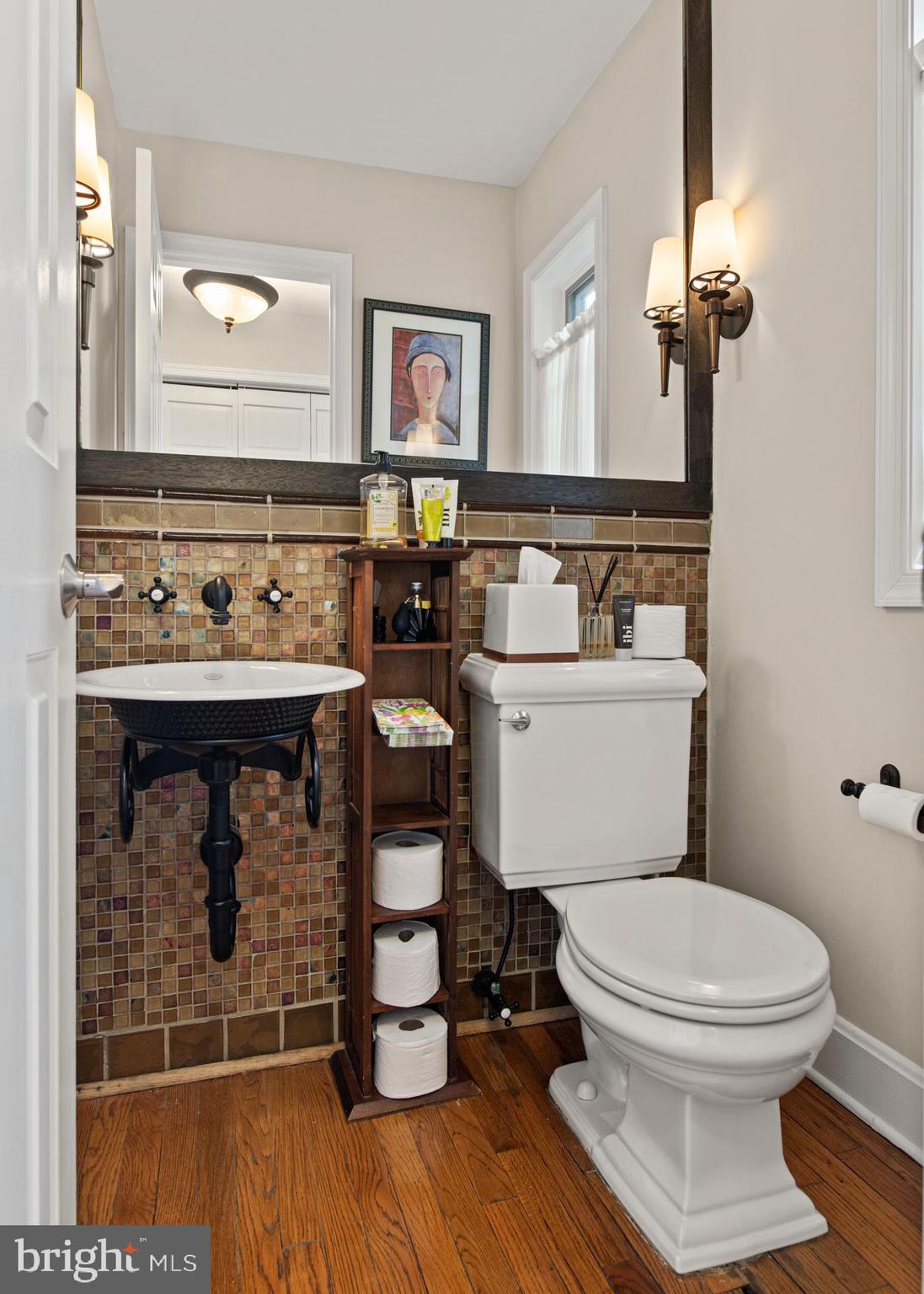 1429 Flat Rock Road Penn Valley, PA 19072 - Photo 28 of 58 a bathroom with a sink toilet and mirror