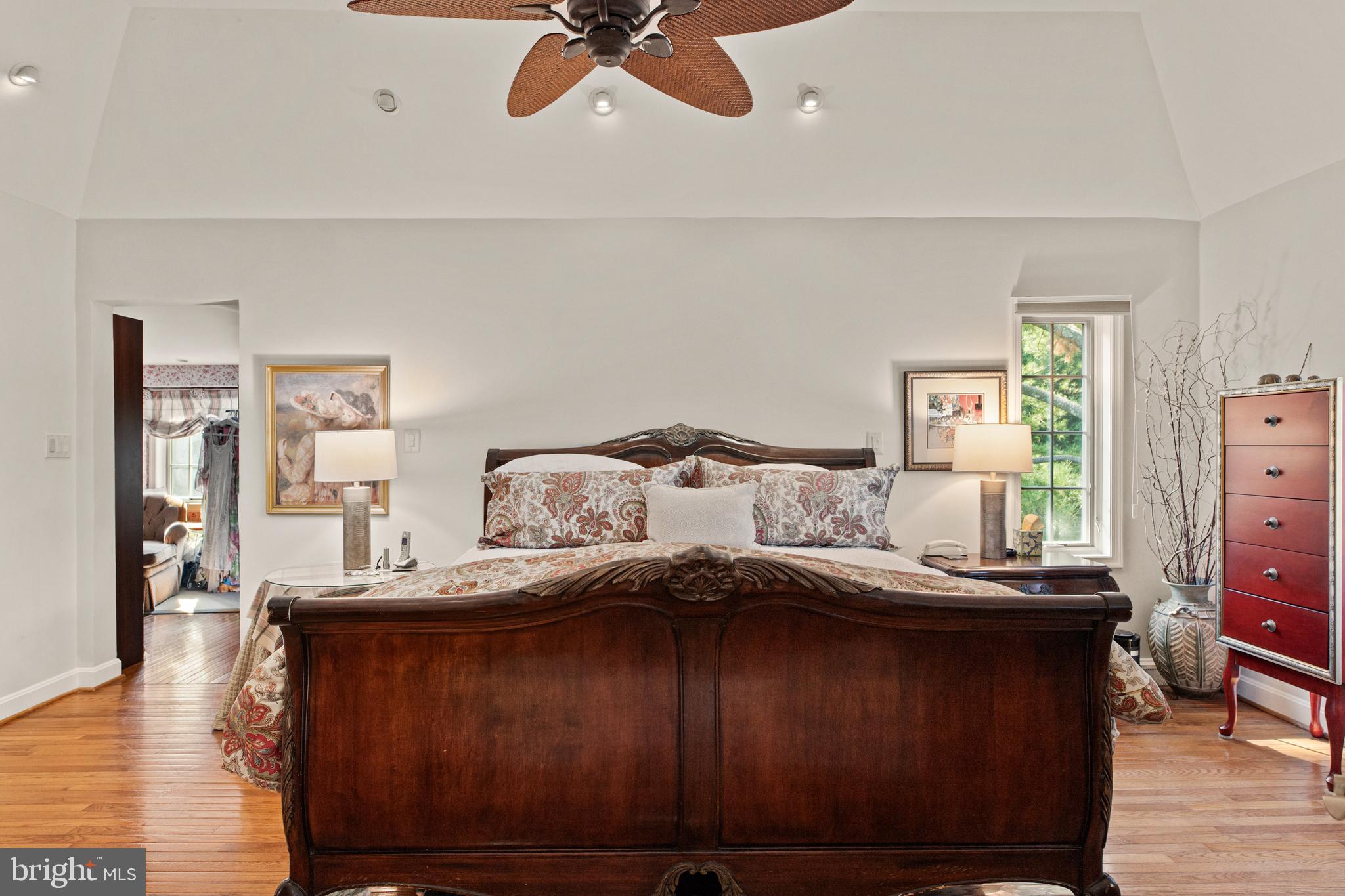 1429 Flat Rock Road Penn Valley, PA 19072 - Photo 31 of 58 a bedroom with a bed and wooden floor