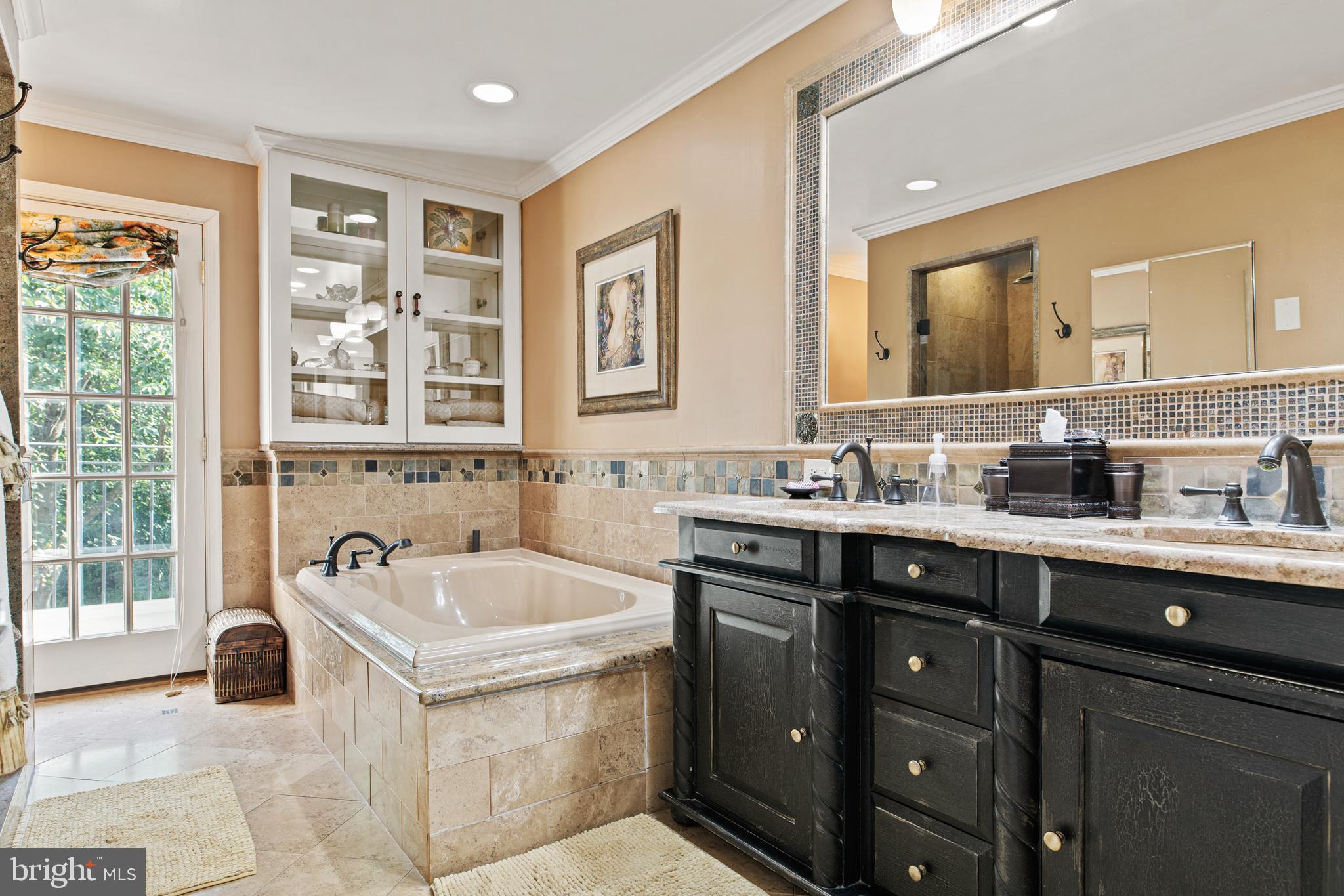 1429 Flat Rock Road Penn Valley, PA 19072 - Photo 35 of 58 a bathroom with a sink double vanity and a tub