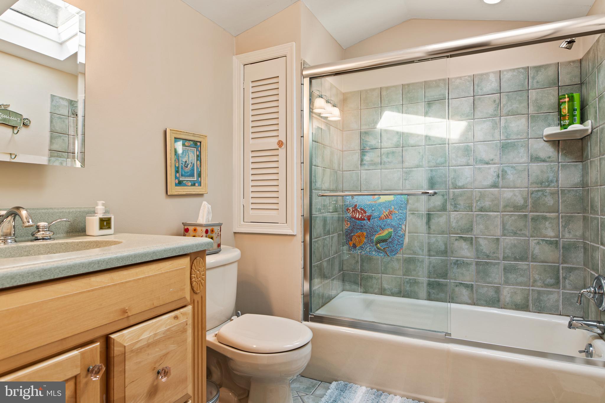 1429 Flat Rock Road Penn Valley, PA 19072 - Photo 43 of 58 a bathroom with a sink toilet and shower